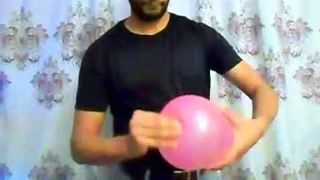Coin in balloon magic trick