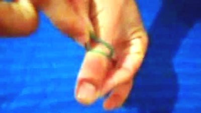 Rubber Band Through Thumb